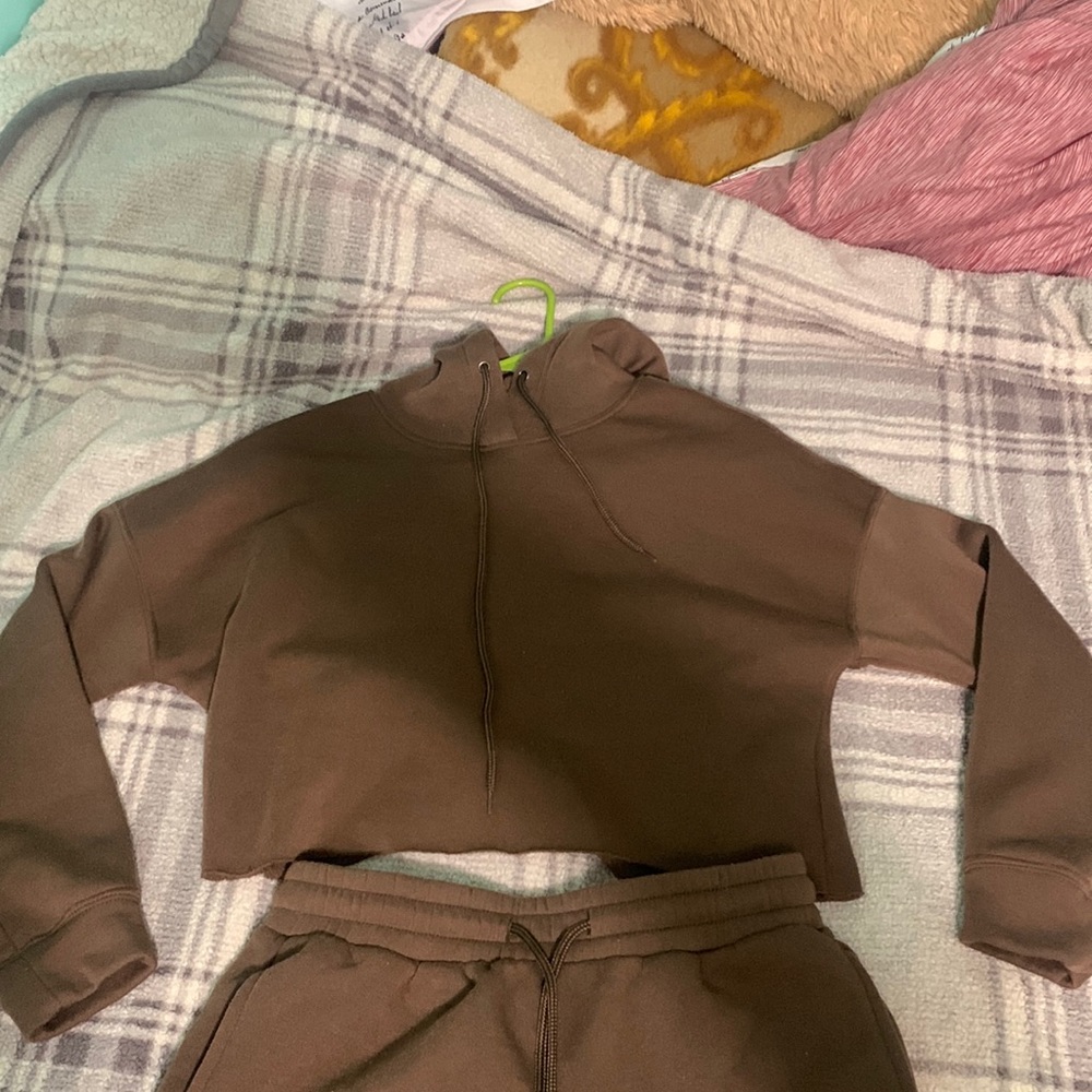 This is a two piece (cropped hoodie and shorts)